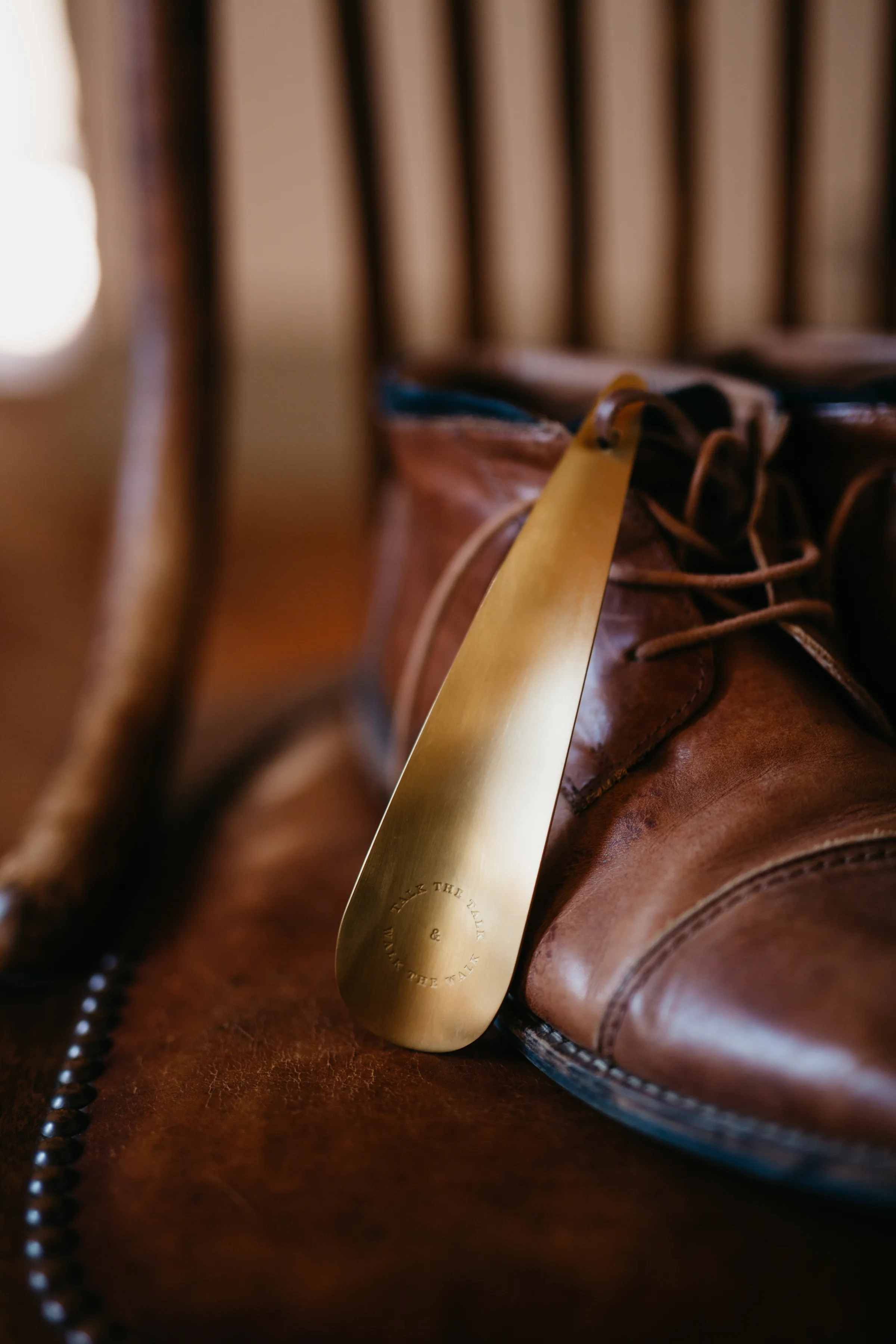 A farmhouse kitchen table set for dinner