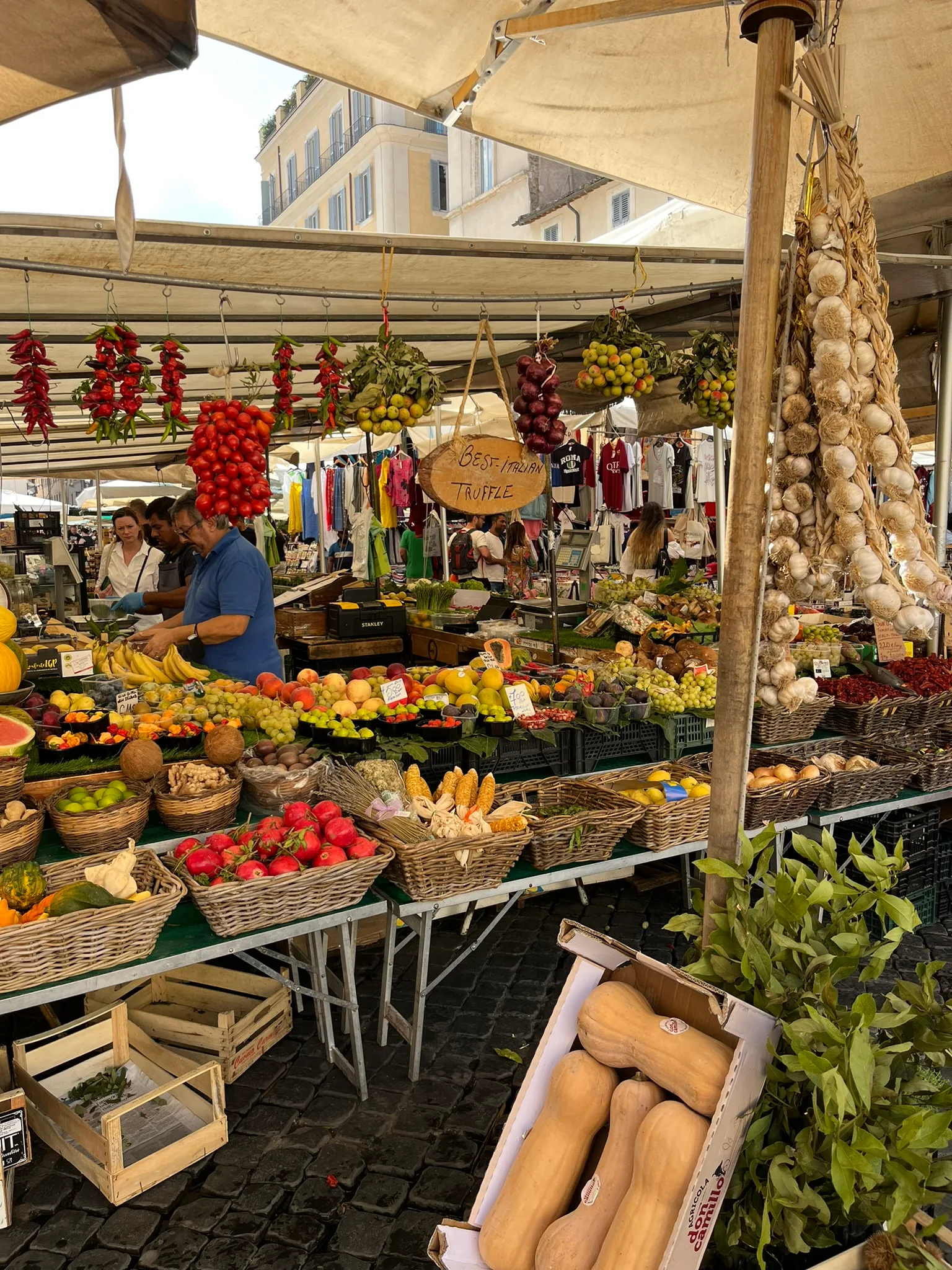 A rustic Tuscan kitchen with copper pots