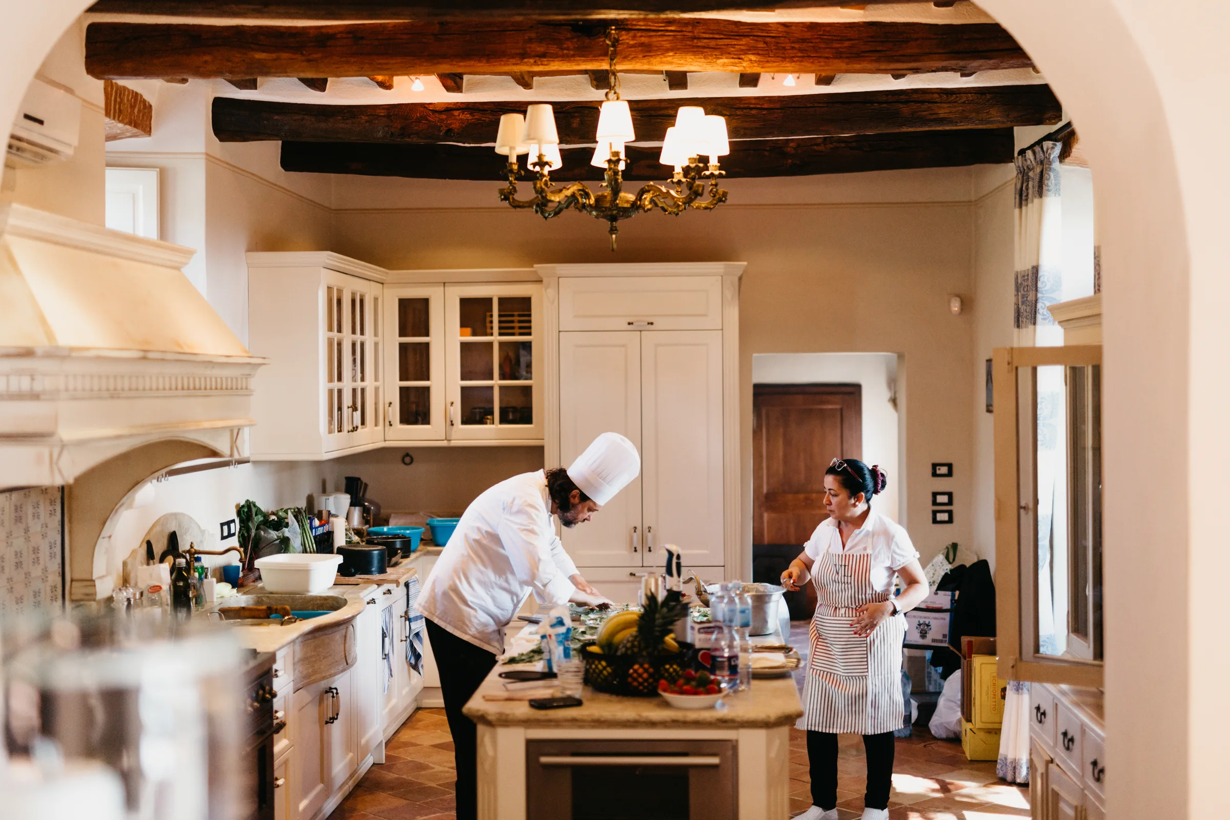 Fresh pasta drying on a wooden rack